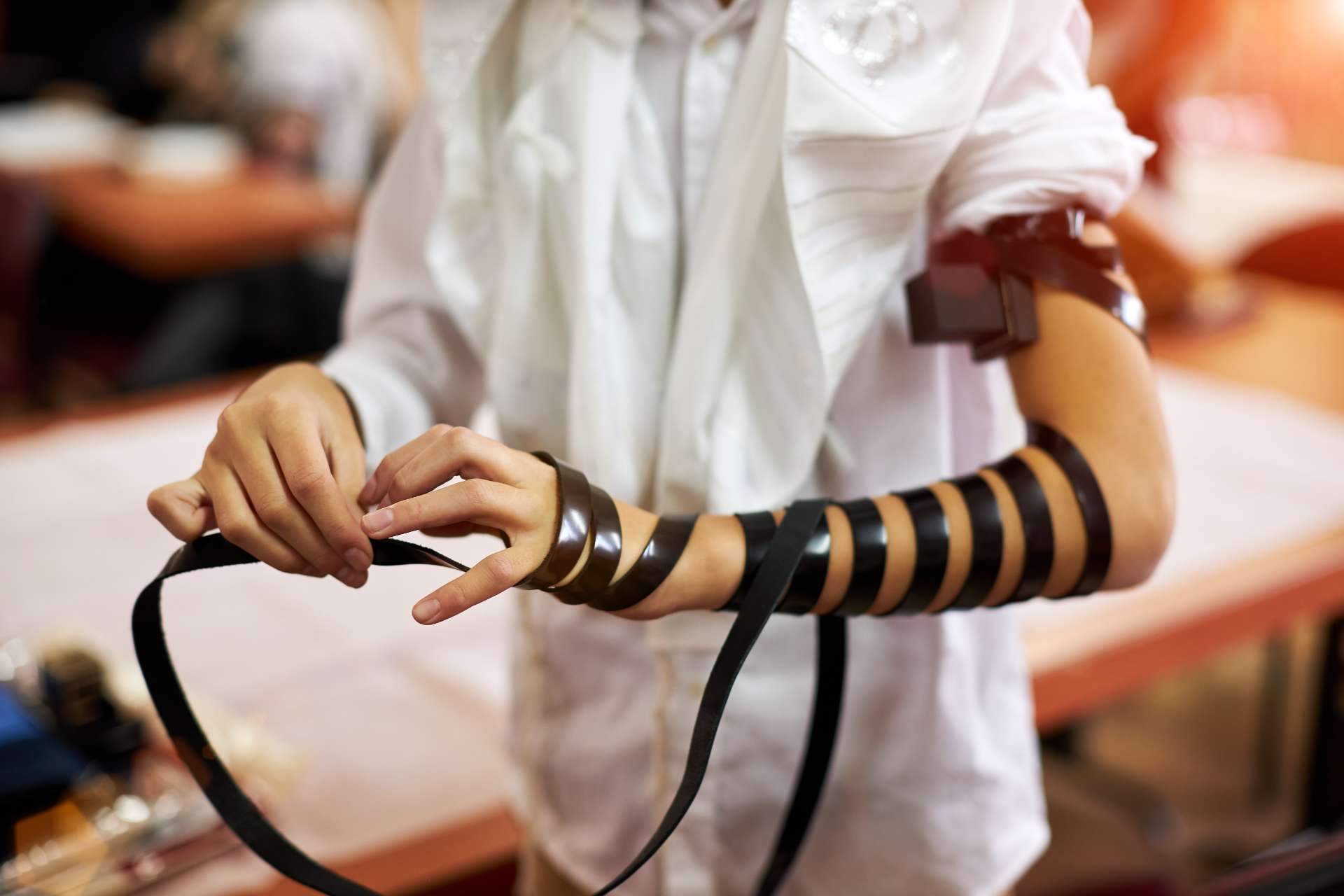 hand-wrap-tefilin-around-other-hand-jewish-teenager-years-old-celebrates-bar-mitzvah-high-quali (1)